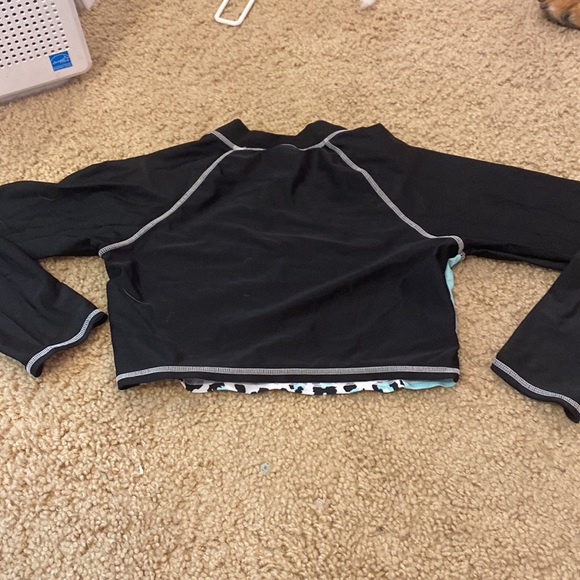 Never worn swimsuit cover up. It also cropped - Picture 2 of 2